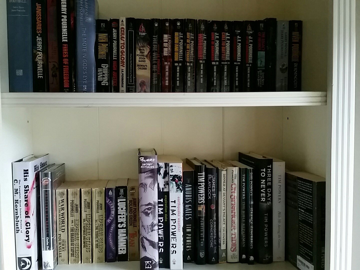 My shelf [and a half] of Jerry Pournelle books