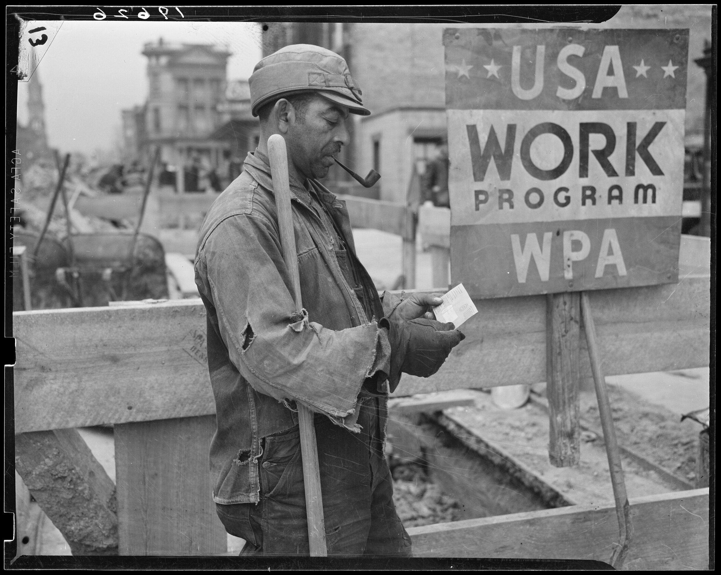Photograph of Works Progress Administration Worker Receiving PaycheckPublic domainSeries: WPA Information Division Photographic Index, ca. 1936 - ca. 1942 Record Group 69: Records of the Work Projects Administration, 1922 - 1944